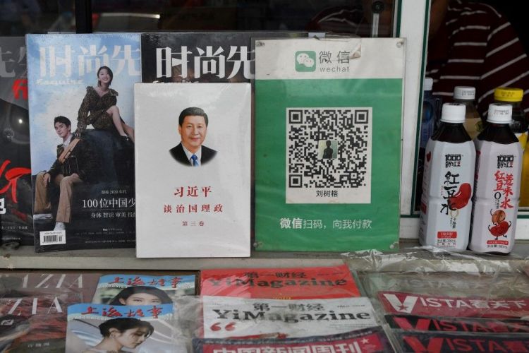 因微信支付涉嫌允许赌博等非法行为进行转帐、洗钱等活动，传腾讯恐遭开罚人民币数亿元。法新社
