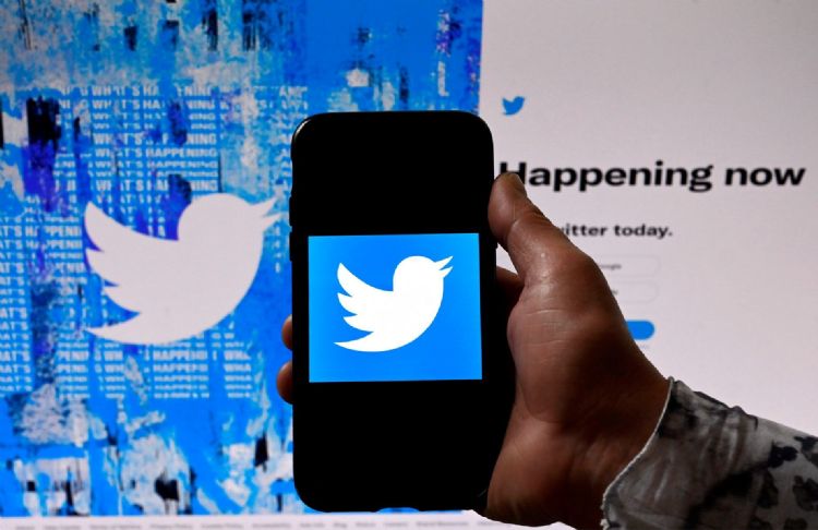 过去一季Twitter新增的1,200万新用户自疫情高峰期以来的最大增长。法新社