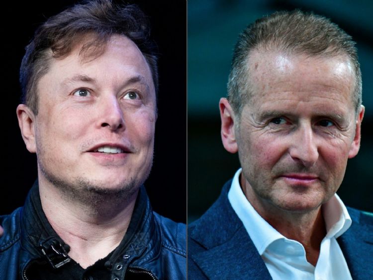 大众CEOHerbert Diess(右)力挺好友Elon Musk纯电动车战略。法新社