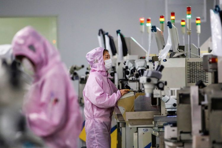 辅信2023年8月营收表现，创近13个月新高。法新社