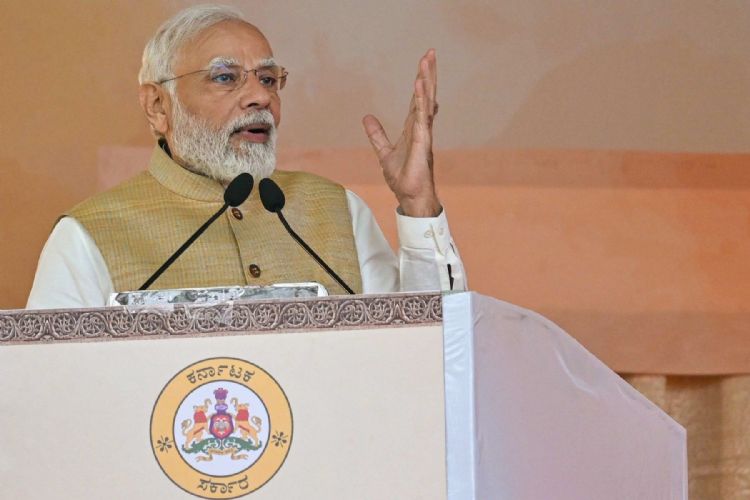 Narendra Modi认为现在正是打造印度为全球制造大国的契机。法新社