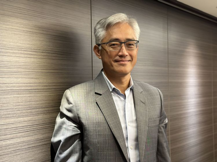 能率网通董事长胡湘麒。杜念鲁摄